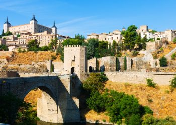 day view of Puente de Alcantara in Toledo. Castile-La Mancha, Spain